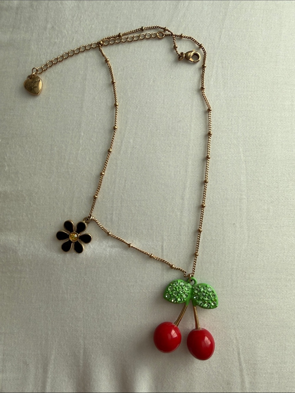 Betsey Johnson Gold-Tone Cherry and Black Flower Necklace with Green Leaves
